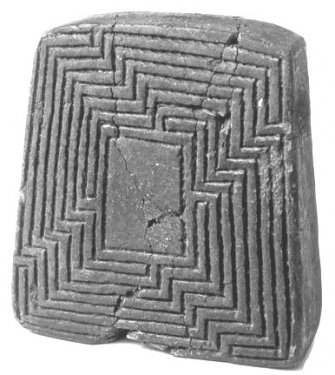 Loom weight with incised labyrinth, impasto clay, late 9th- first half 8th c. BC, National Archaeological Museum, Sibari. Loom weight with incised labyrinth, impasto clay, late 9th- first half 8th c. BC, National Archaeological Museum, Sibari.